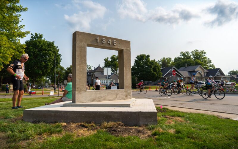 people riding into Indianola RAGBRAI